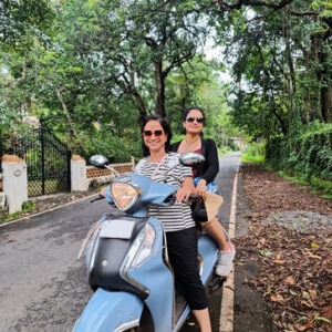 Goa women only group tour with F5 Escapes - Women travelers riding bicycles through the scenic Divar Islands in Goa.